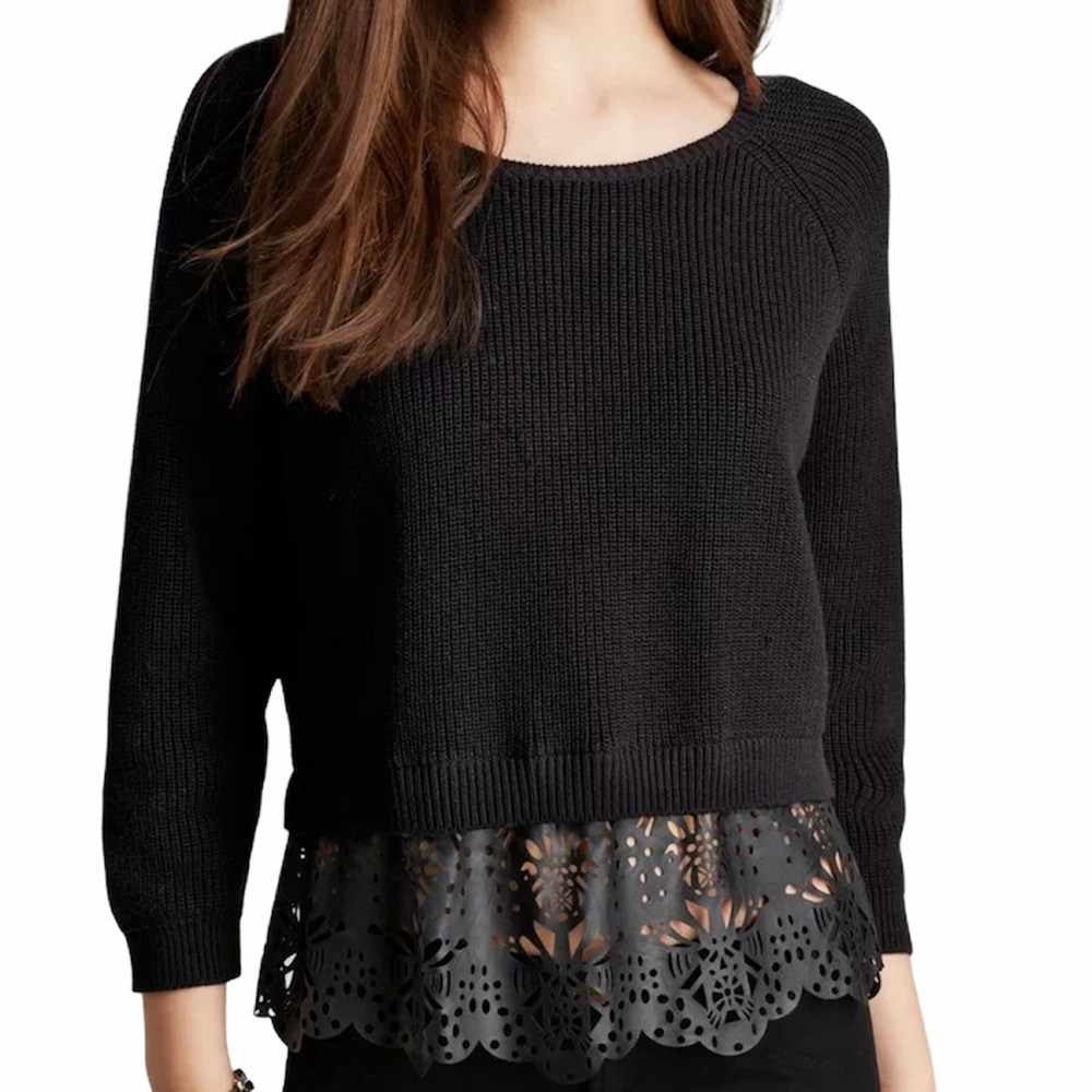 Sweater with laser cut trim bottom